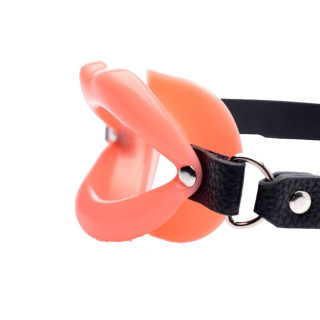Ouvre-bouche en silicone rouge avec lanière